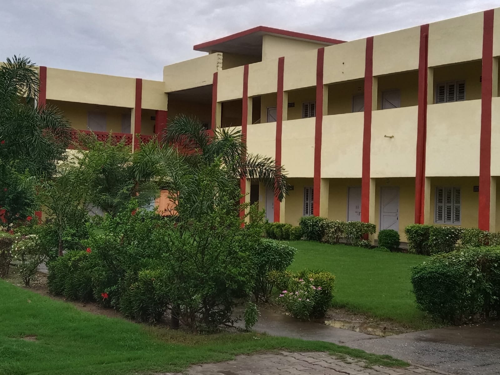 Landscaped college courtyard and academic block